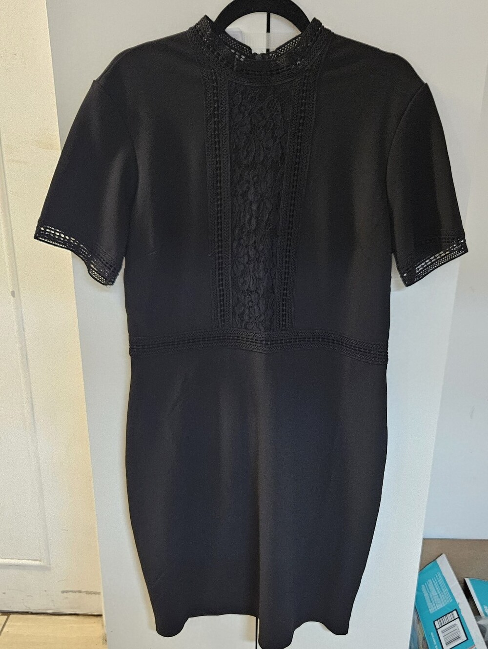 Mock-Neck Black Mini Dress with Lace Panel